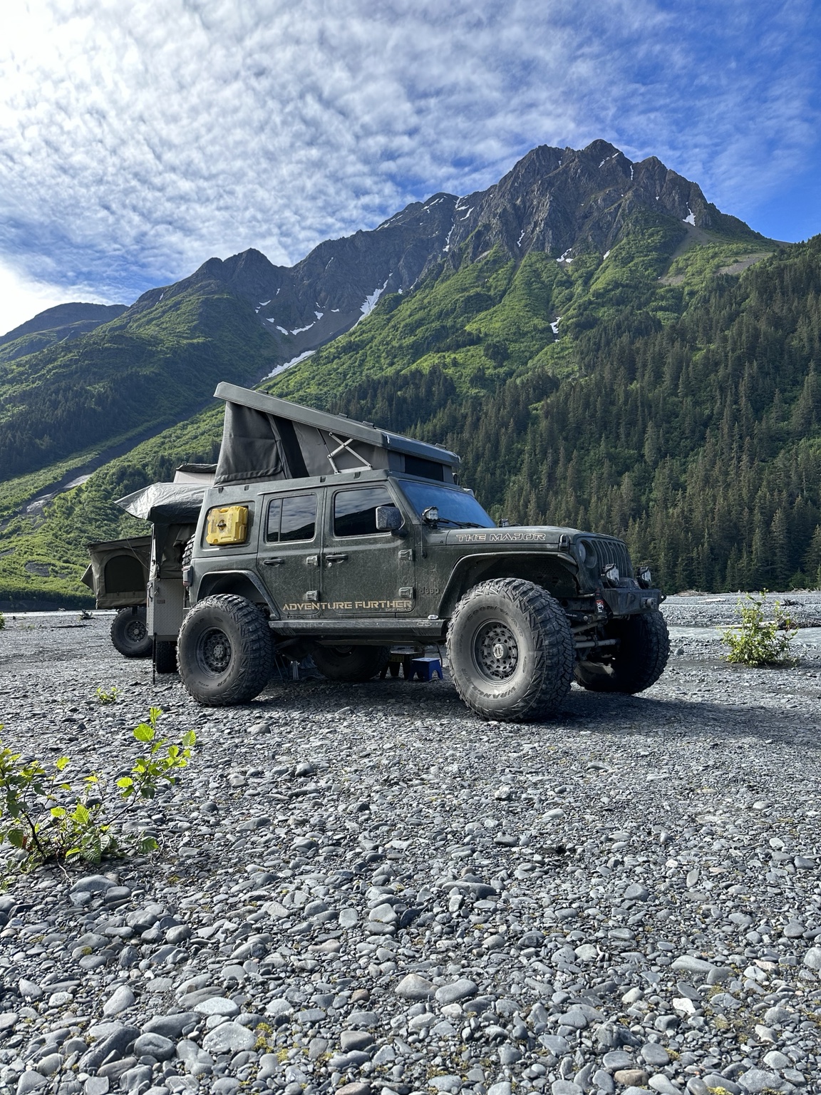 Diesel Jeep Wrangler on 42-inch tires with pop-up camp setup
